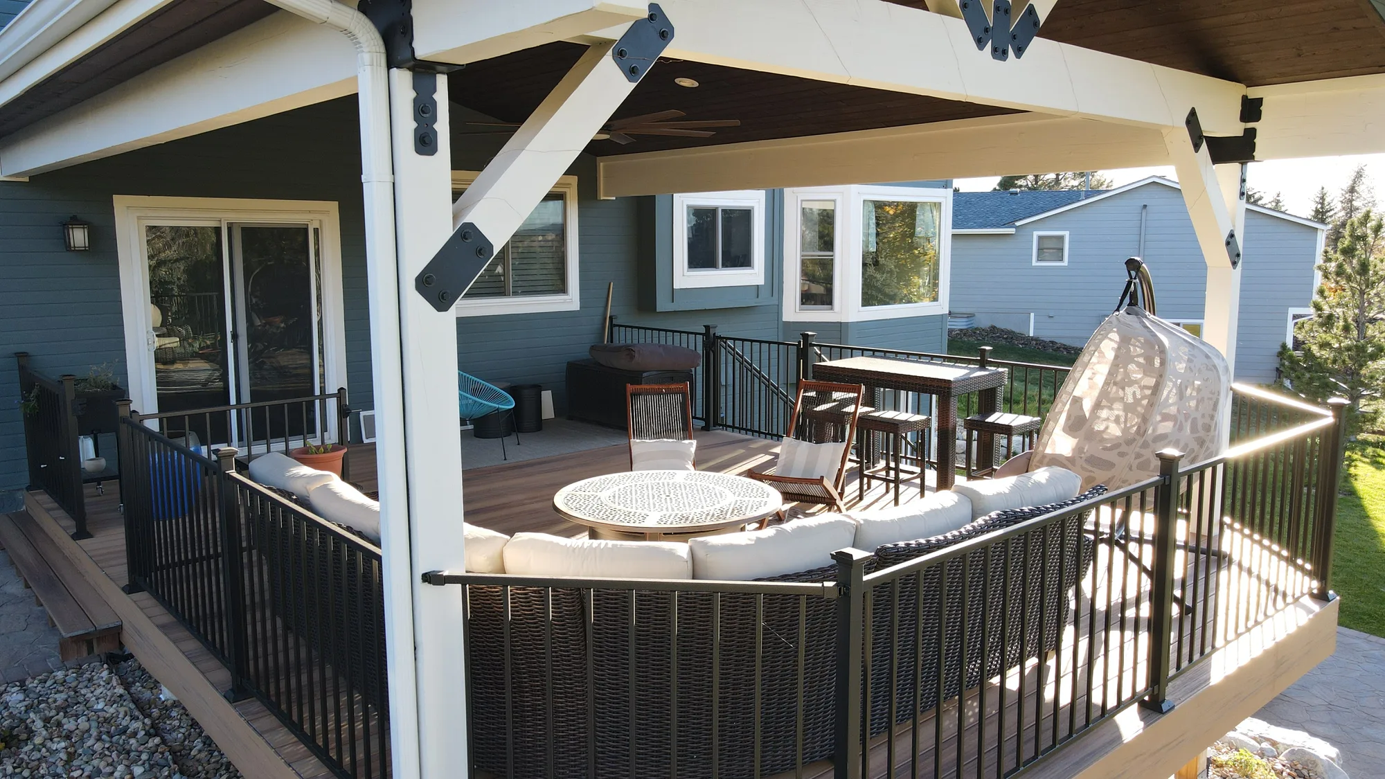 Covered Outdoor Living Space by Stewart Remodel Design Build