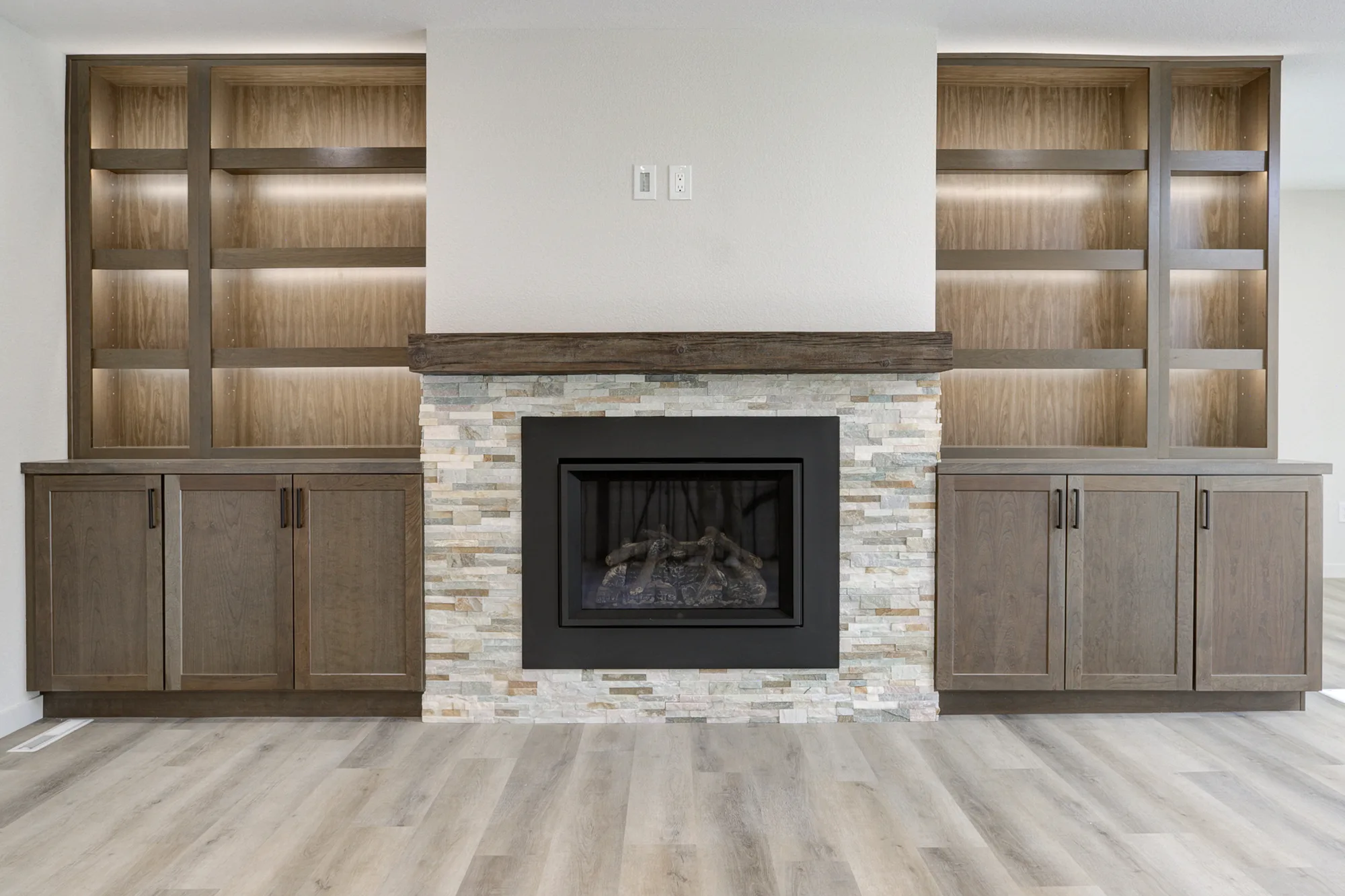Stone Fireplace Surround by Stewart Remodel Design Build
